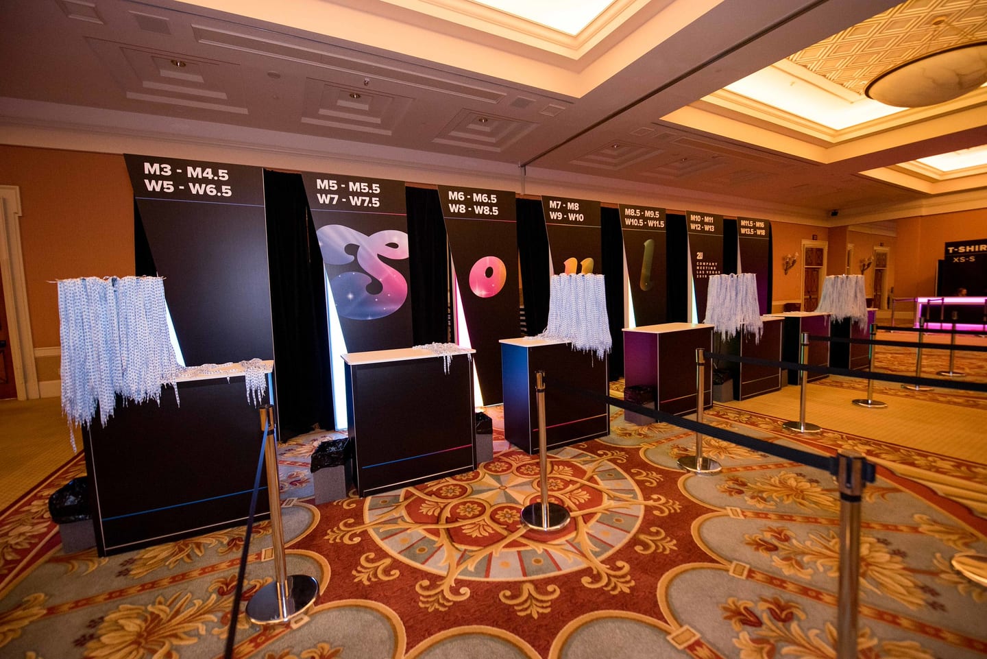 Large SOUL letter boards standing in an empty ballroom before doors open
