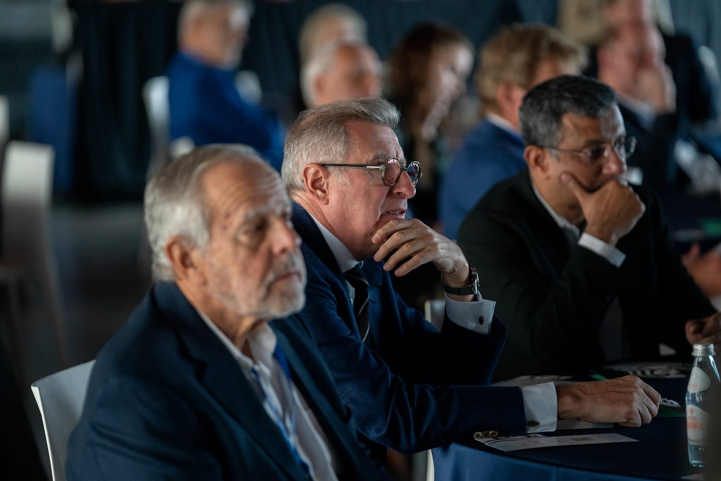 Attendees listening in profile from a row of seats at the Automotive News Congress: Los Angeles, City Market Social House