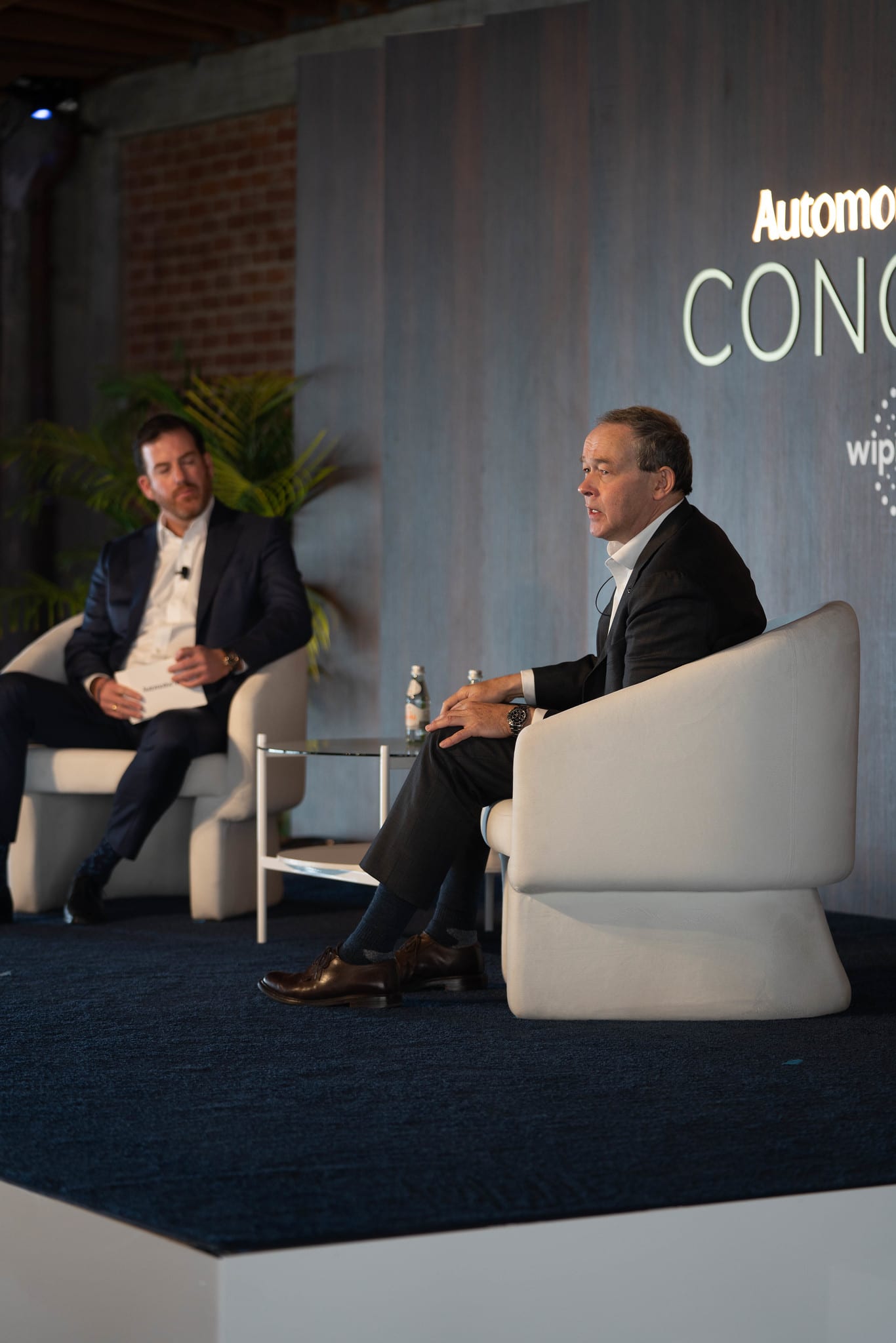 A vertical frame of two speakers on stage, shot for the client’s social team at the Automotive News Congress: Los Angeles, City Market Social House