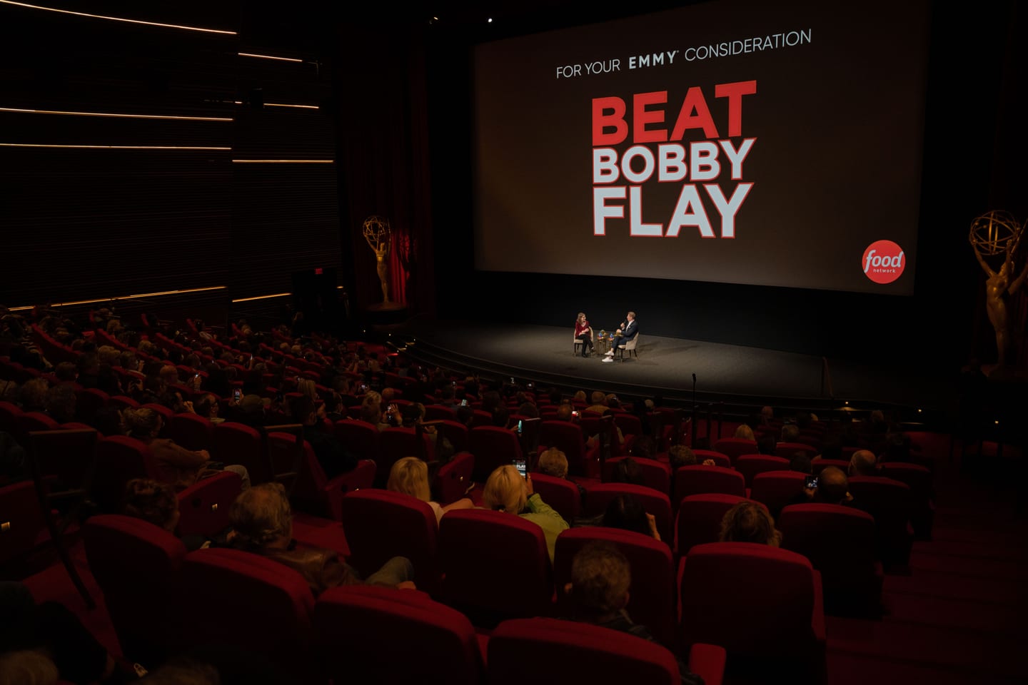 Audience in a theater at a “Beat Bobby Flay” Emmy consideration screening in Burbank