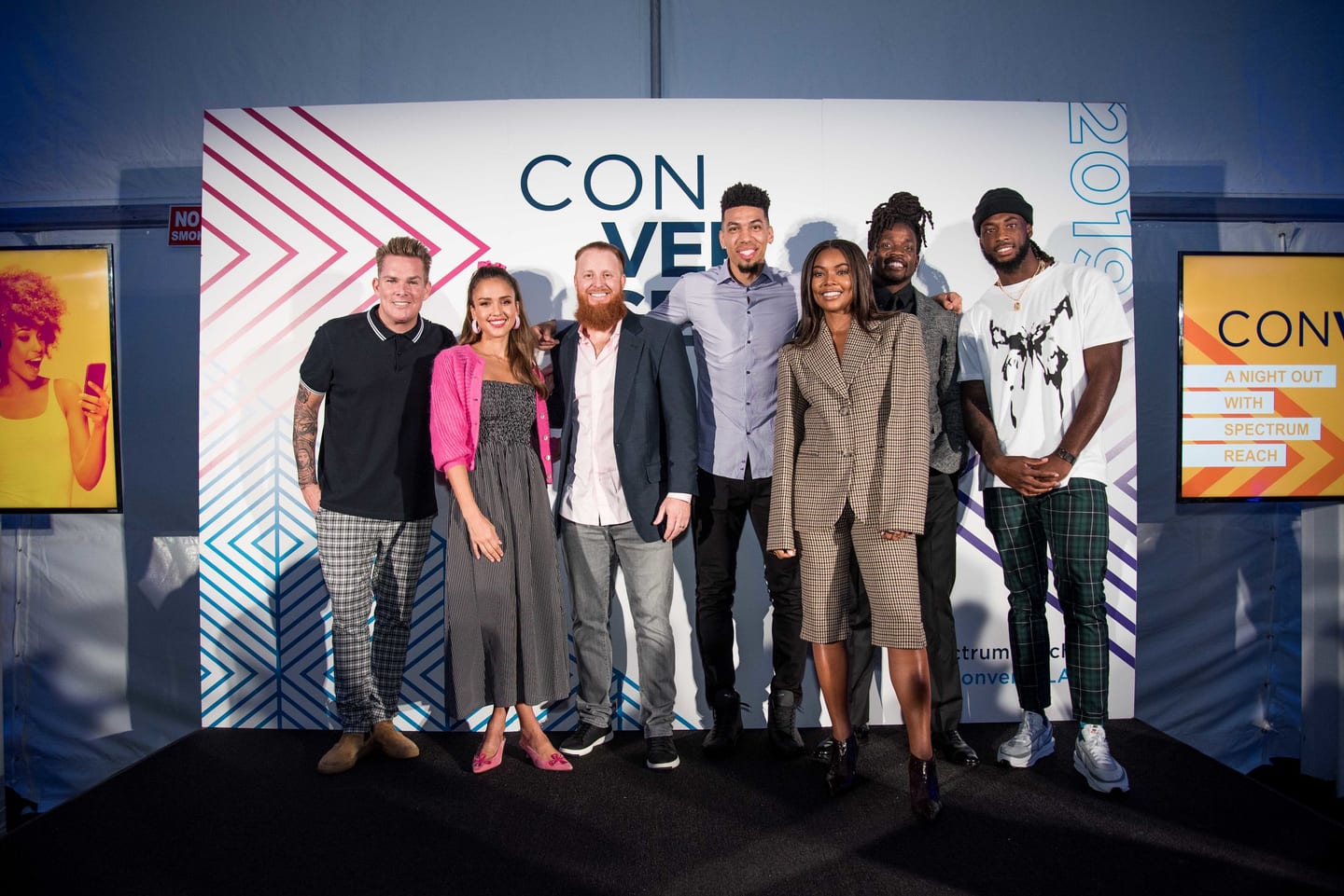 Panel discussion on stage at a convention, shot by a corporate event photographer