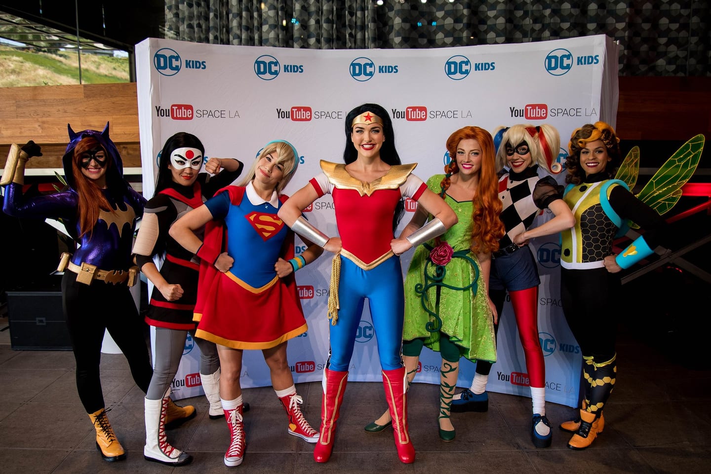 DC superhero cosplayers at a fan event