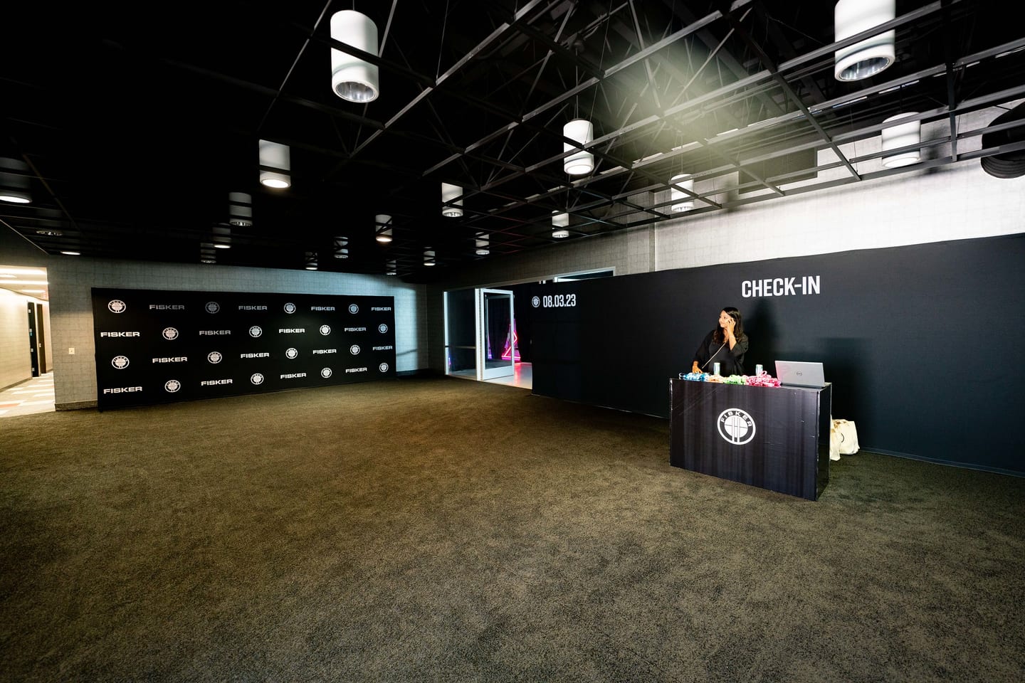 The check-in desk in the empty venue before guests arrive