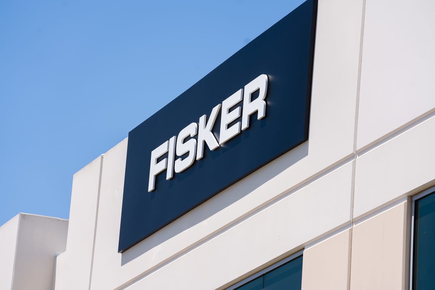 The FISKER sign mounted on the exterior of the building