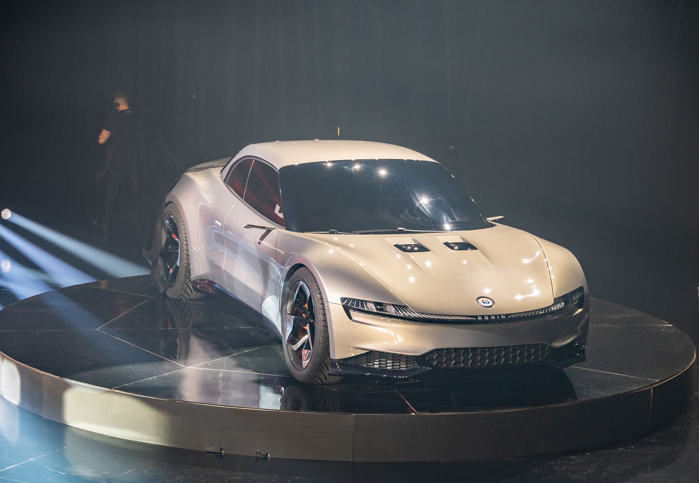 The Fisker Ronin alone on the lit turntable