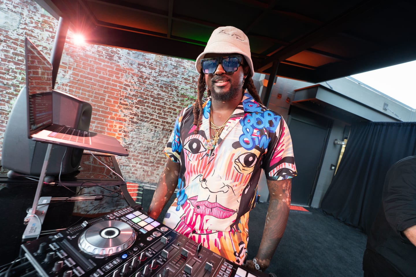 The DJ working the decks at the after-party