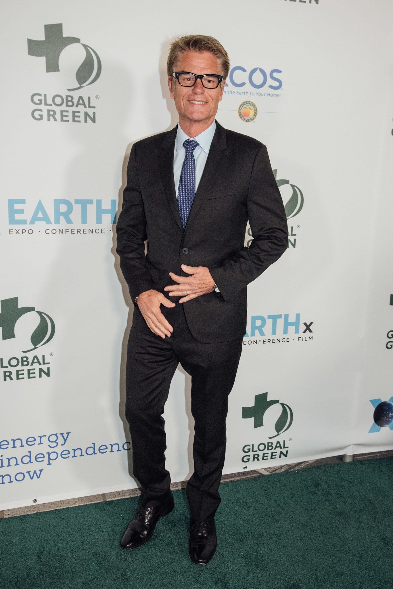 Guest on the step-and-repeat at the Global Green pre-Oscar party