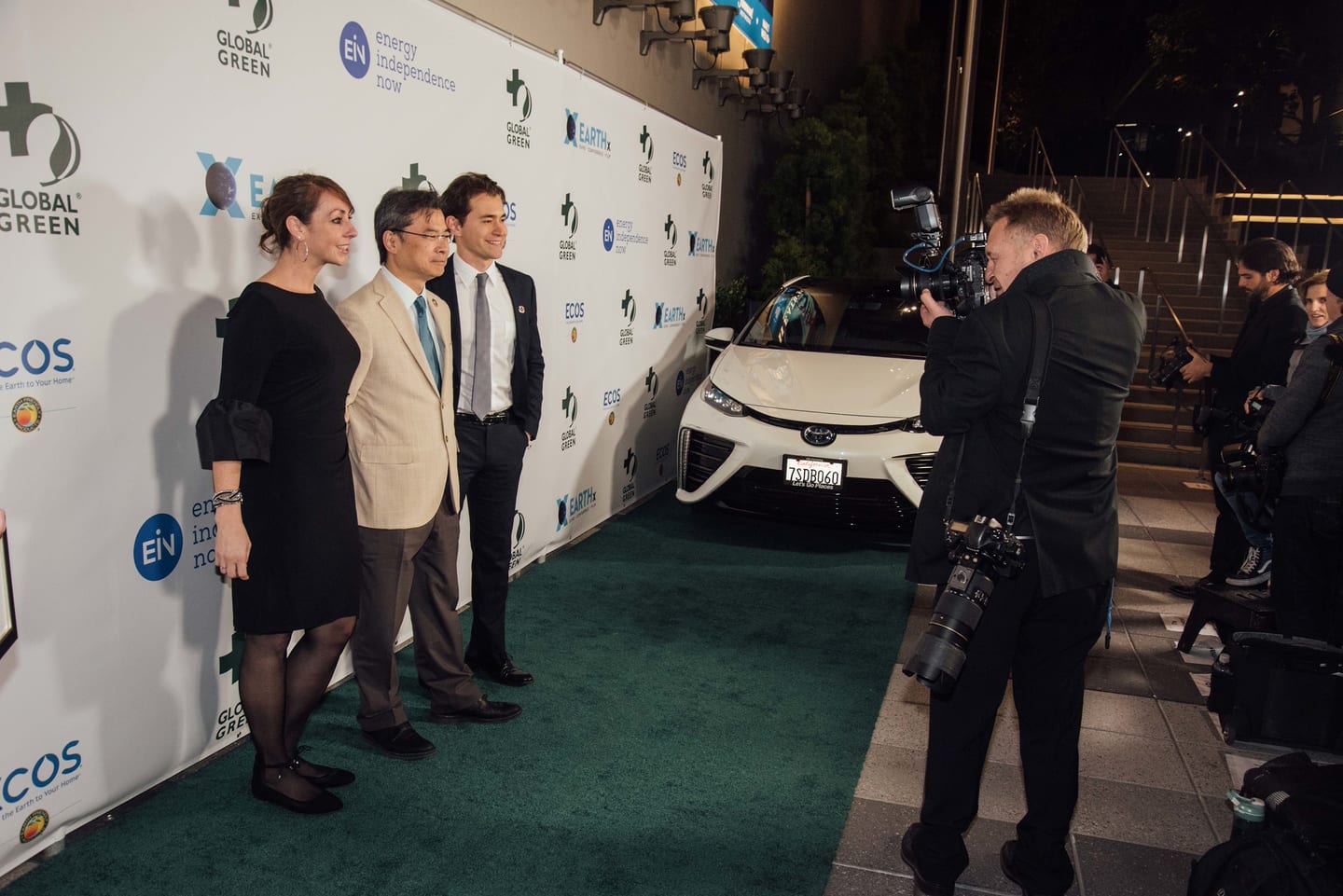 Photographers working the green carpet and press line at the 15th annual Global Green pre-Oscar gala at NeueHouse Hollywood
