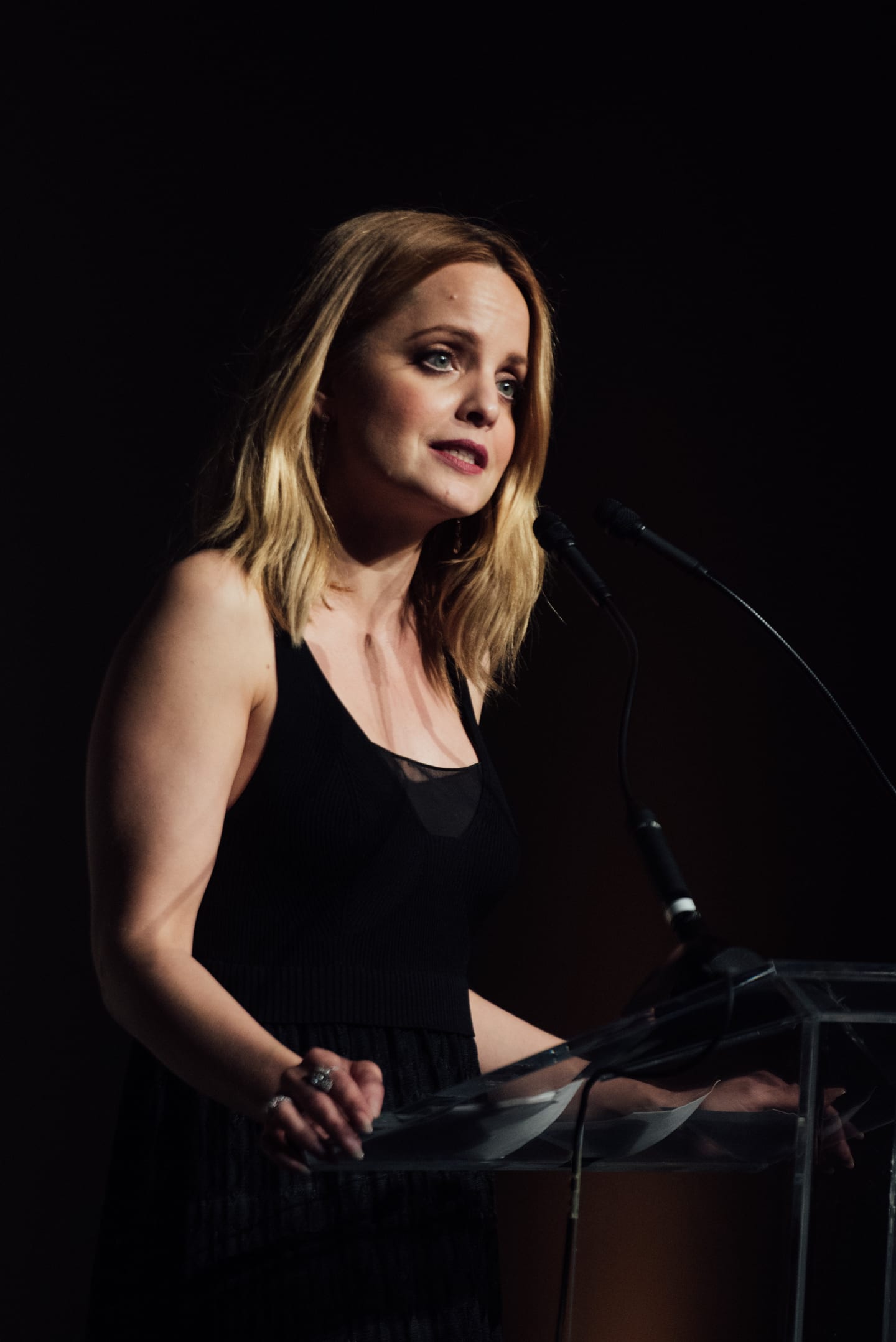 A speaker addressing the room from the podium at the 15th annual Global Green pre-Oscar gala at NeueHouse Hollywood