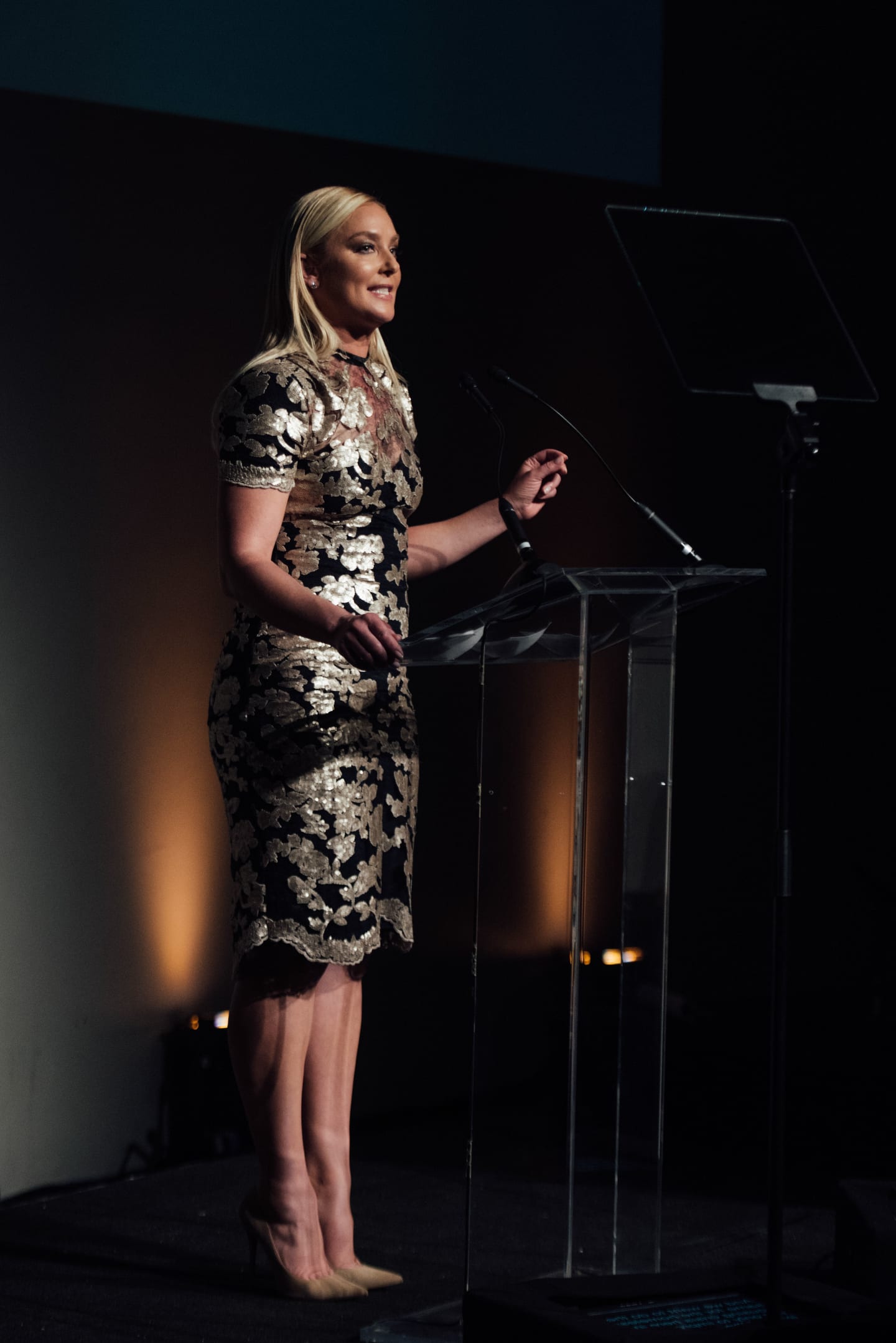 A speaker addressing the room from the podium at the 15th annual Global Green pre-Oscar gala at NeueHouse Hollywood