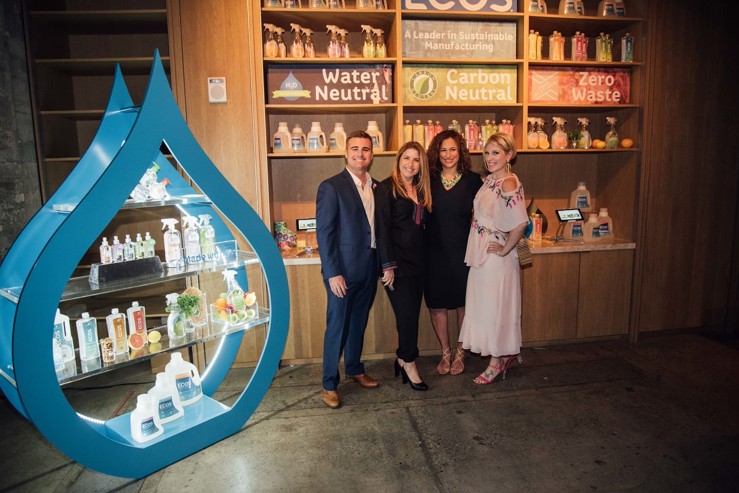 Guests beside a sponsor product display at the 15th annual Global Green pre-Oscar gala at NeueHouse Hollywood