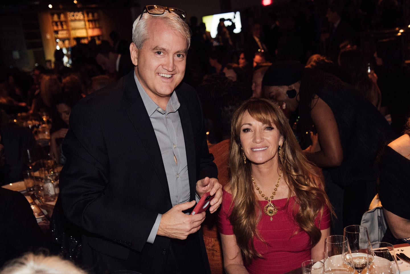 Actress Jane Seymour with a guest at a table during the Global Green pre-Oscar gala