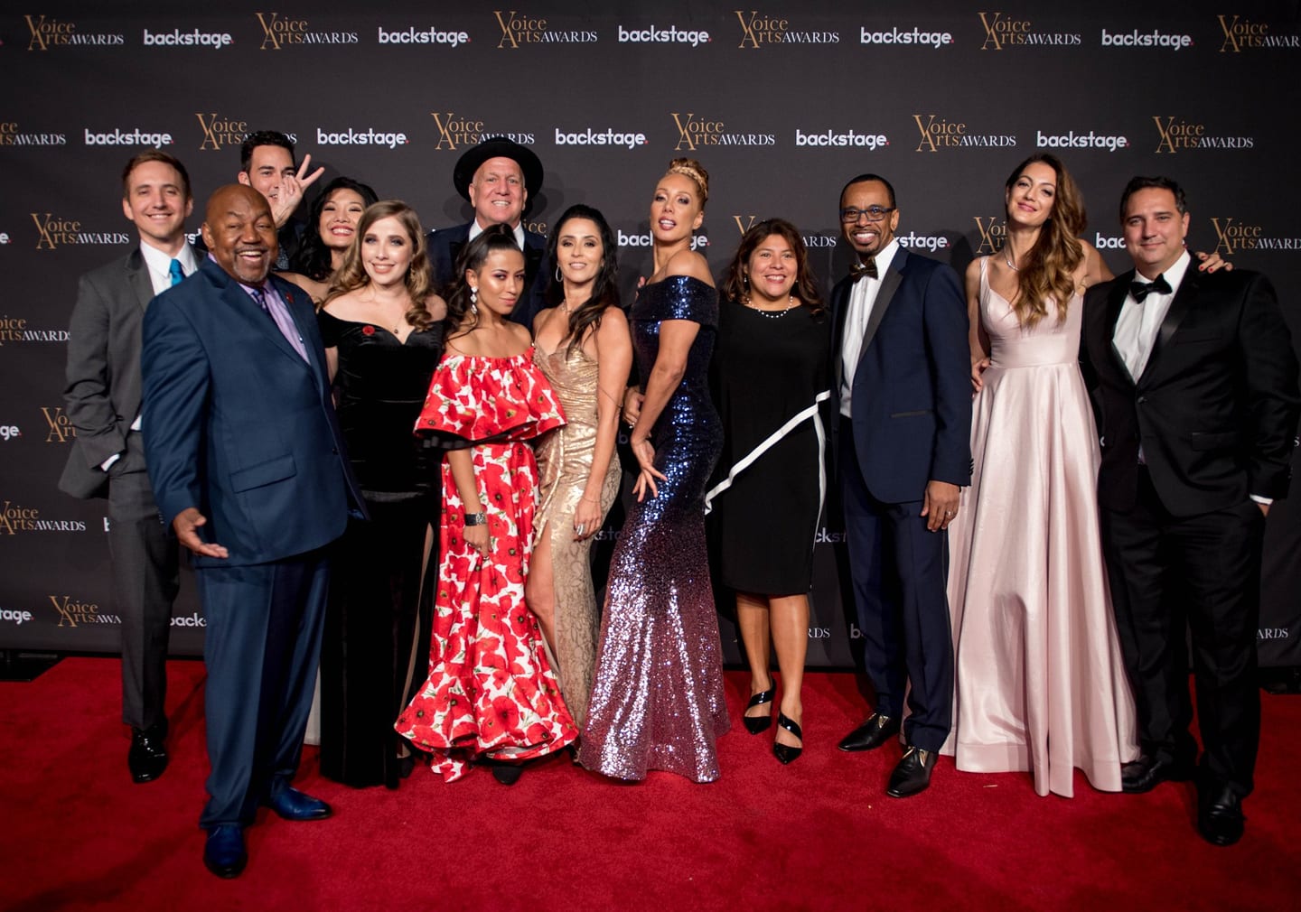 Formalwear guests on the red carpet at a gala
