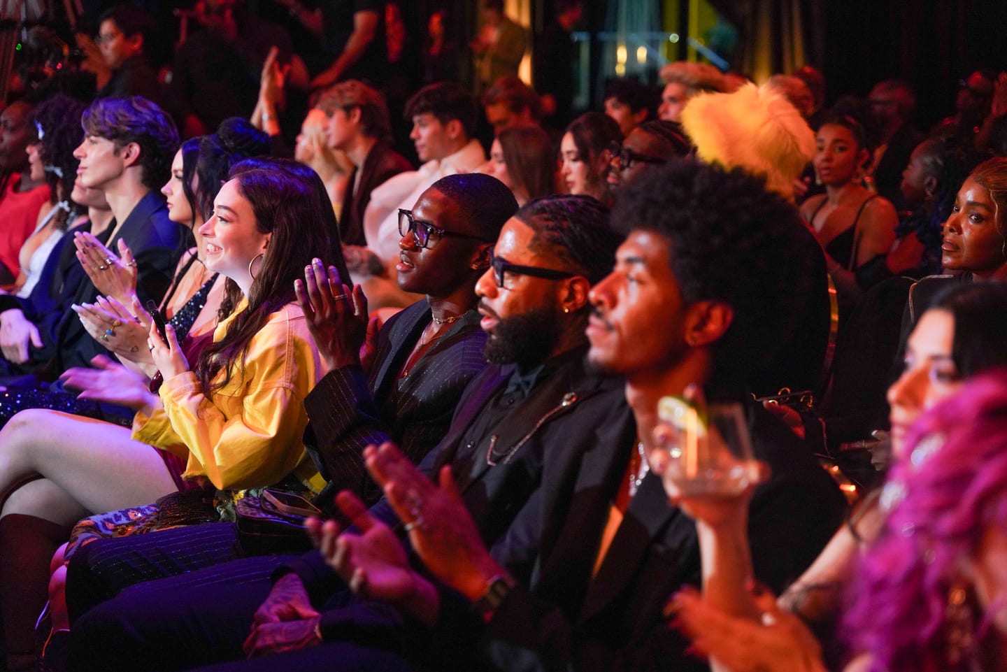 Guests in the audience reacting during the ceremony