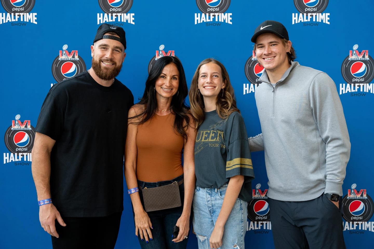NFL star Travis Kelce with guests at a Pepsi Super Bowl Halftime Show event
